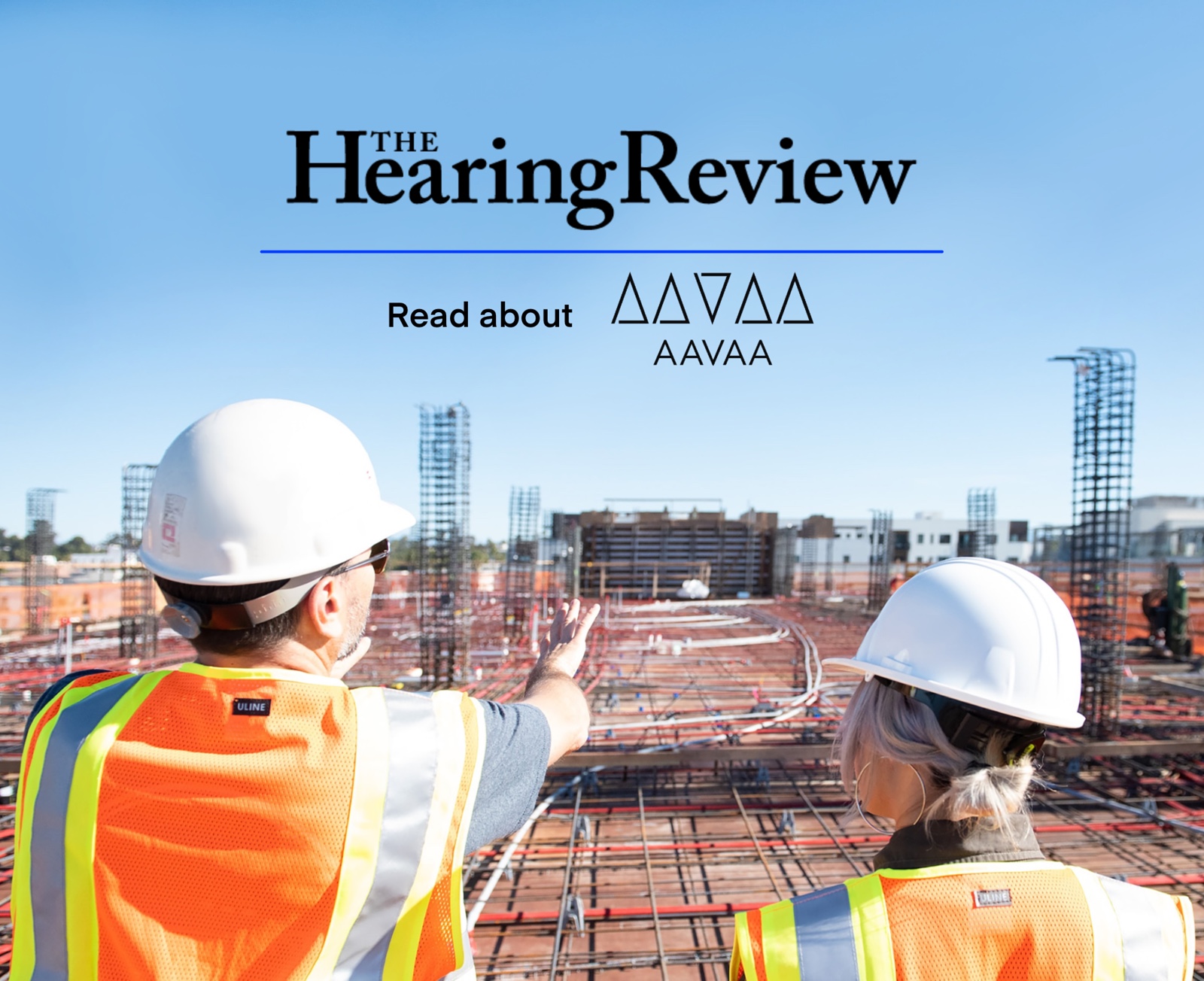 Two construction workers looking to a construction zone. The Hearing Review, read about AAVAA